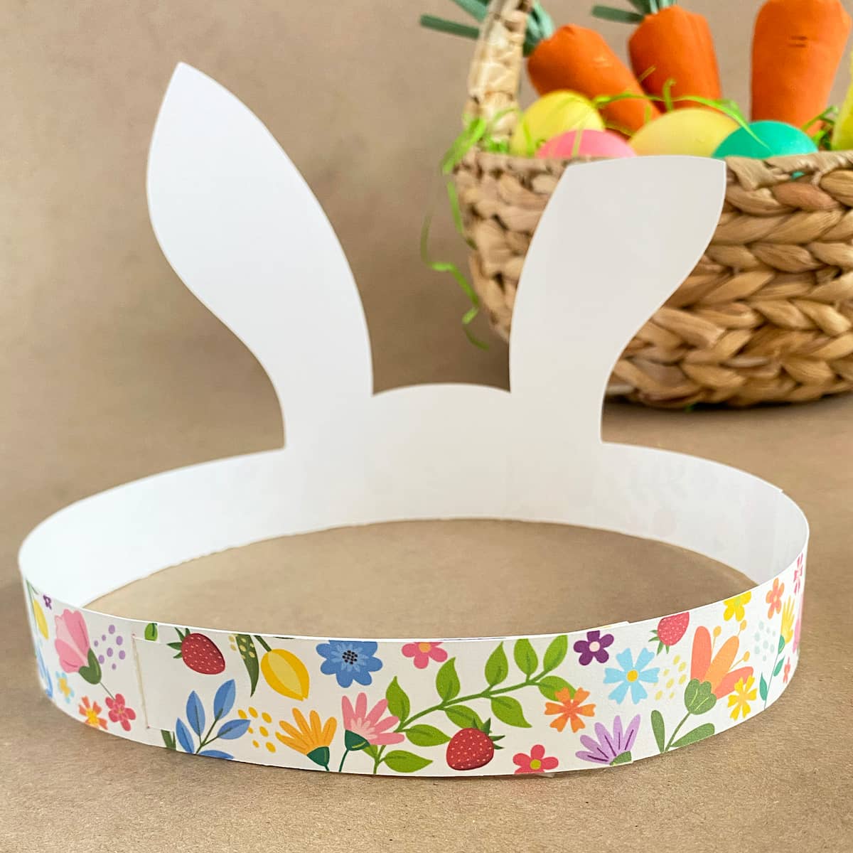 Close-up detail of colorful floral band on Easter bunny crown headband, back side